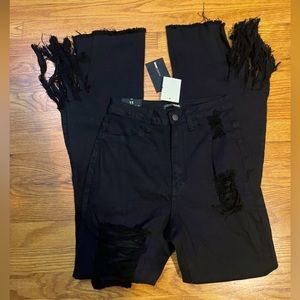NWT Fashion Nova black distressed jeans. Size 11